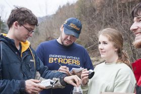 Morgan King, third from left, led a team of EWB members on a trip to Prenter.