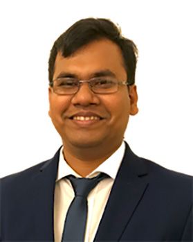 Headshot of WVU researcher Abdullah Al-Mamun. He is pictured against a white background wearing a dark colored suit over a white dress shirt and dark tie. He has short dark hair and is wearing glasses. 