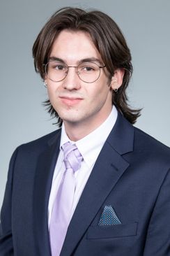 serious young man, glasses