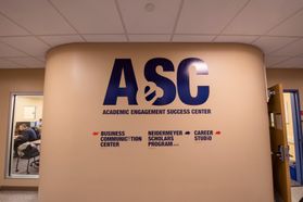 AeSC Center logo on a wall. 