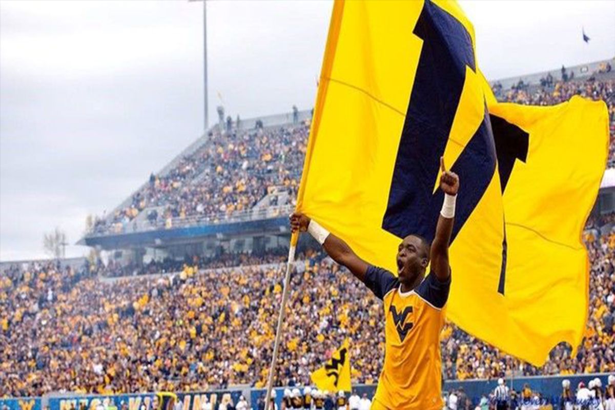 Lionel Marshall cheering at a WVU football game