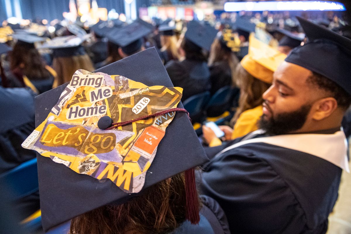 Staff, students and faculty celebrate December Commencement in the Coliseum Dec. 15, 2018.