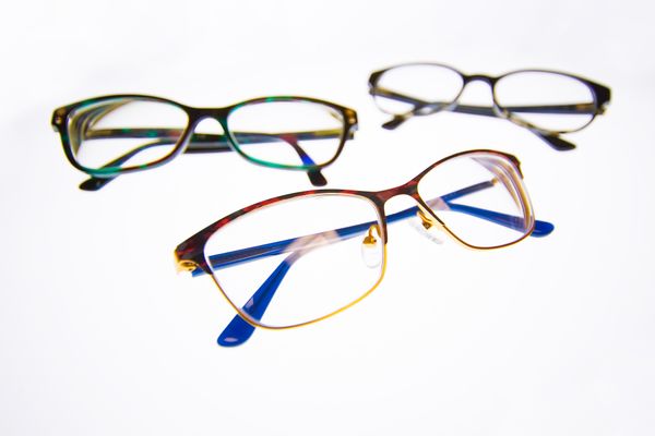 three pairs of glasses