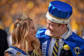 A week of Homecoming activities at West Virginia University culminated with the crowning of Douglas Ernest, Jr. (right) and Kendra Lobban (left), as the 2018 king and queen.