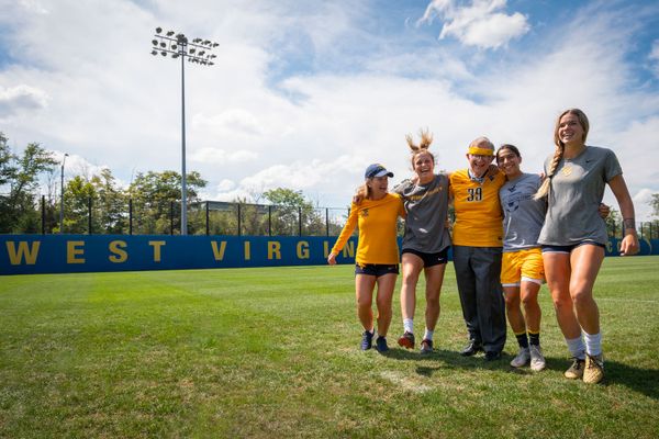 Gordon Gee with some members of the women's soccer team.