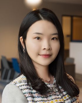 Headshot of WVU researcher Hyeonsuh Lee. She is pictured inside wearing a multicolored blouse. She has medium length dark hair. 