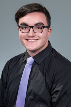 smiling young man, glasses