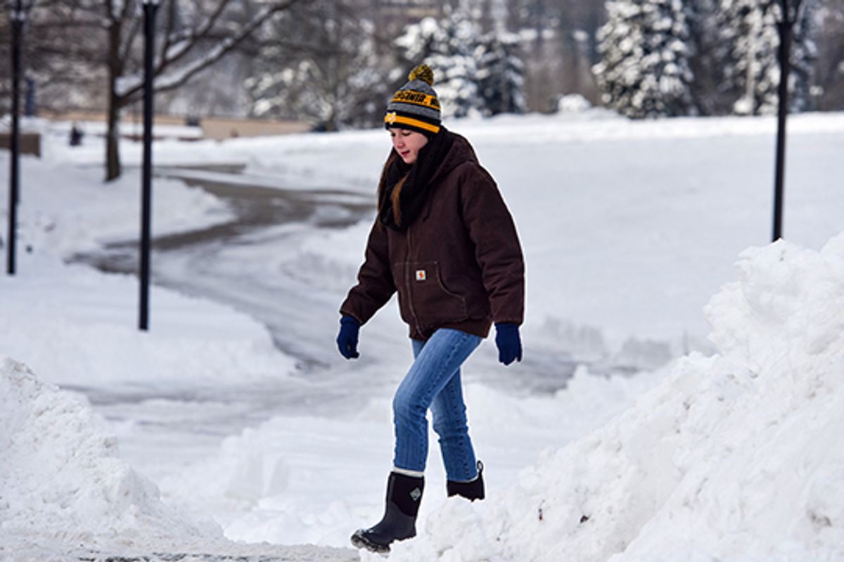 WVU student walks in snow
