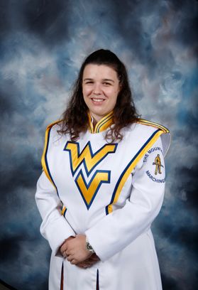 Professional photo of a girl with dark brown hair in a WV marching band uniform