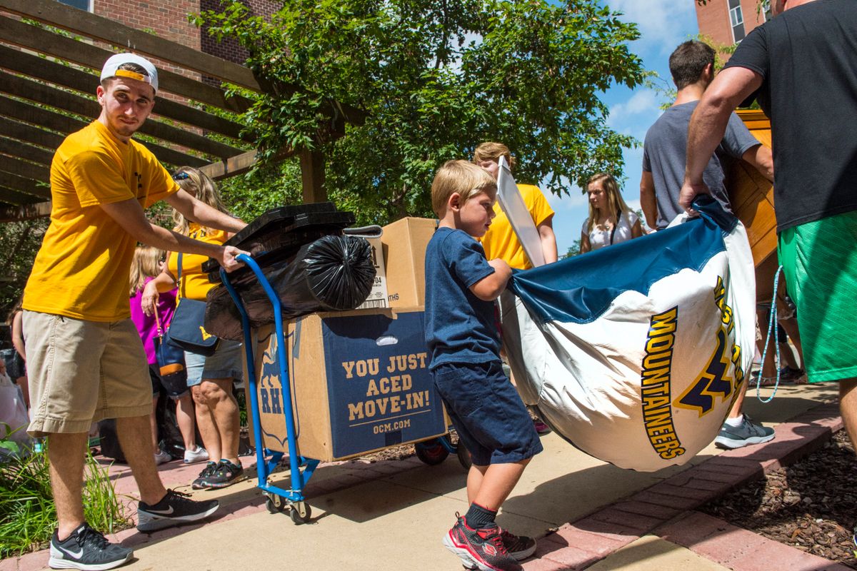 Students of all ages help during Honors College move-in day for the start of the 2016-17 school year.