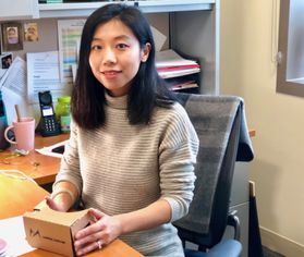 Photo of Shan Jiang, assistant professor of landscape architecture in the School of Design and Community Development in her office