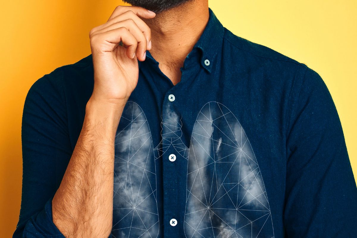 illustration of lung cancer against a close up of man's chest 