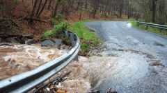 Flooding damages a road