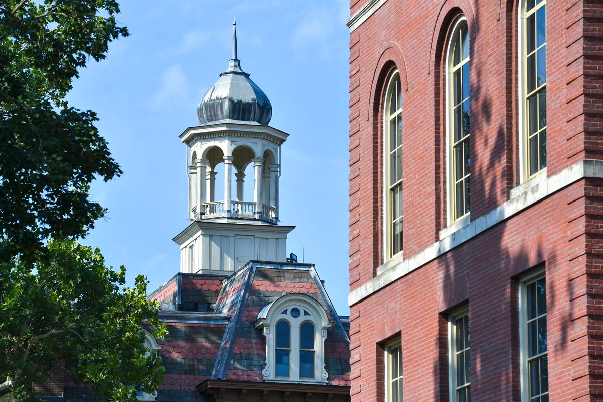 Red brick building with a tower on top