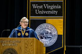 President Gordon Gee addresses graduates during the Eberly College of Arts and Sciences and the College of Business and Economics December Commencement in the Coliseum December 15th, 2017. Photo Brian Persinger