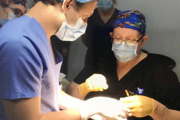 Gregory Borah and Josh David perform reconstructive surgery to help a domestic abuse victim