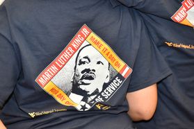 Back of a t-shirt with photo of Martin Luther King and WVU Day of Service