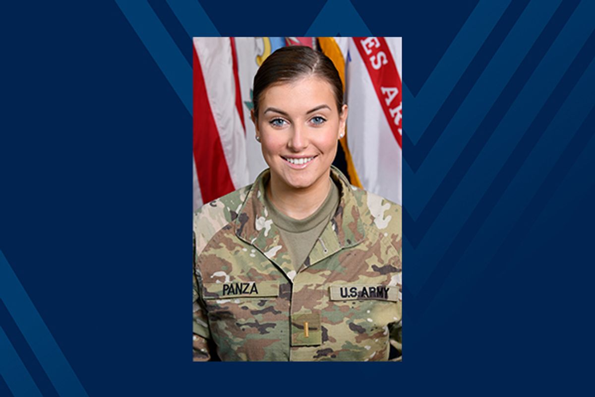 smiling woman, combat fatigues, flags in background