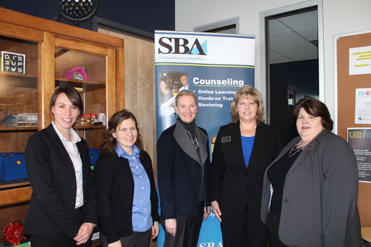 From left to right are Laura Maas, Program Manager  Office of Women's Business Ownership- Small Business Administration, Andrea McCardle, Director, WVU Women's Business Center, Melinda Walls, Assistant Vice President of Innovation and Entrepreneurship at WVU, Karen Friel, District Director, Small Business Administration WV District Office, and Kim Donahue District Office Technical Representative and Small Business Administration Development Specialist for Southern WV.