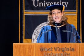 Chief Medical Officer and Professor in the School of Medicine, Dr. Judie Charlton addresses those in attendance at December  Commencement in the Coliseum Dec. 15, 2018. 