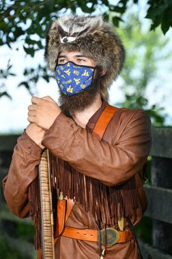 man in mask and buckskins