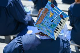 mortarboard decorated with piano keys, flying WV 