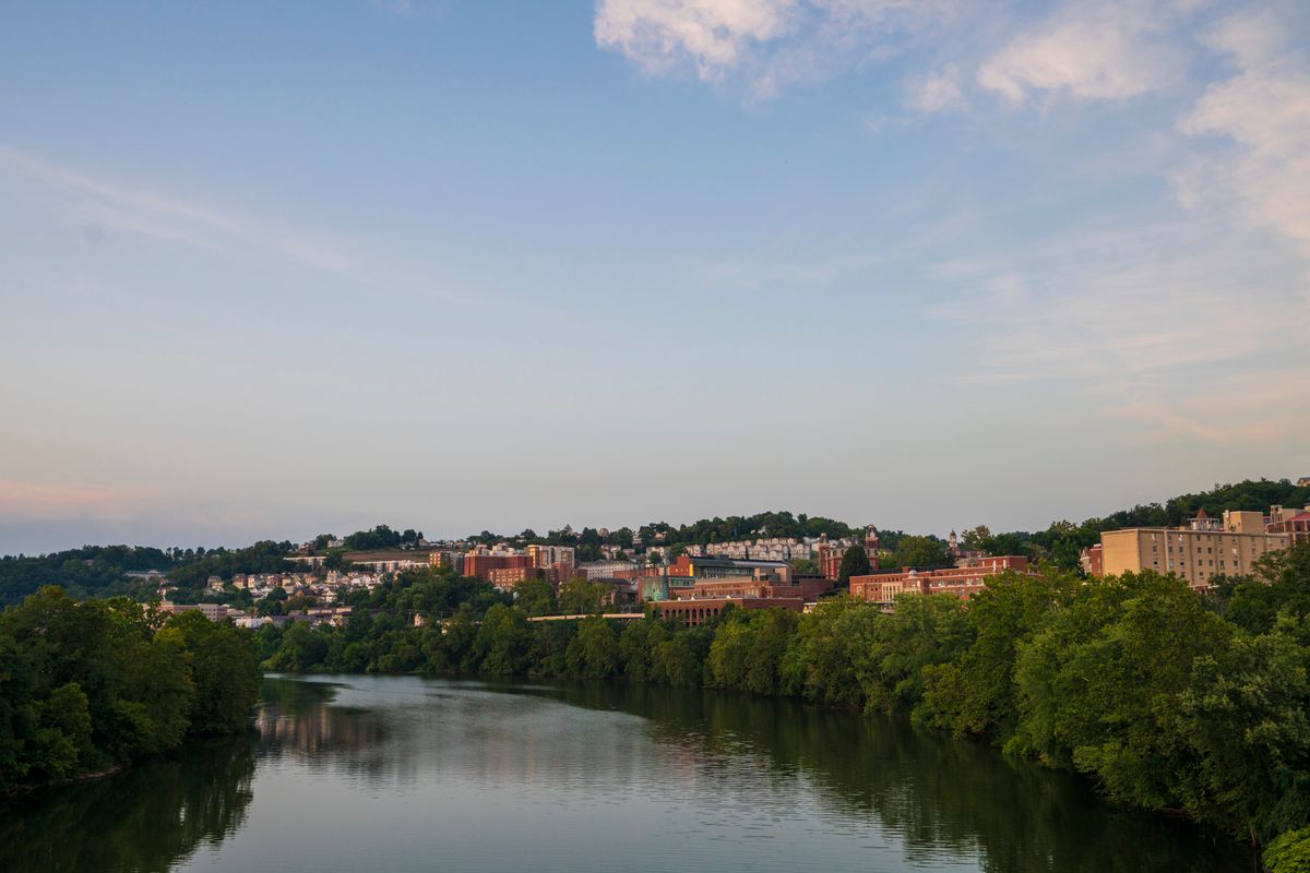 river with city skyline at dusk