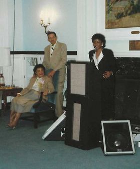 Geraldine and Horace Belmear listen as Dr. Patrice Harris speaks at Mrs. Belmear’s retirement reception at Elizabeth Moore Hall