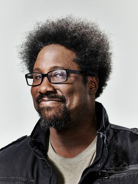 smiling black man with glasses