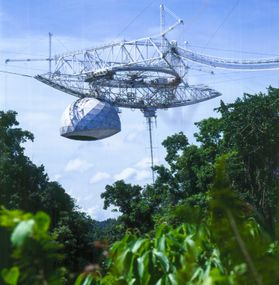 The Arecibo Observatory in Puerto Rico is recognized as one of the most important national centers for research in radio astronomy, planetary radar and atmospheric and space sciences. Photo credit: Courtesy of the Arecibo Observatory, a facility of the Na