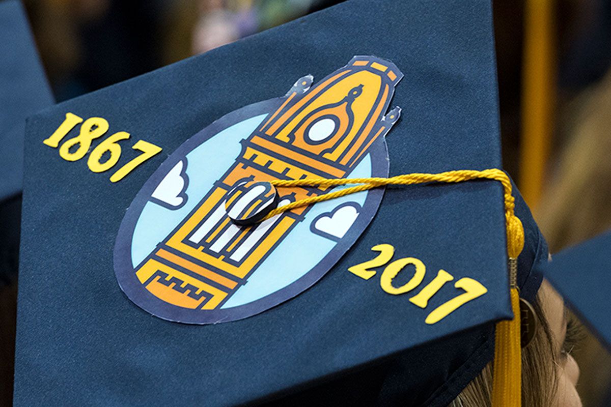 Graduation cap with the WVU 150th logo on the top