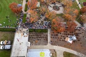This photo was taken from the top of the Engineering Sciences Building at WVU, looking down 11 stories at the crowd on the group below surrounding the pumpkin target which is an area covered with a white sheet.