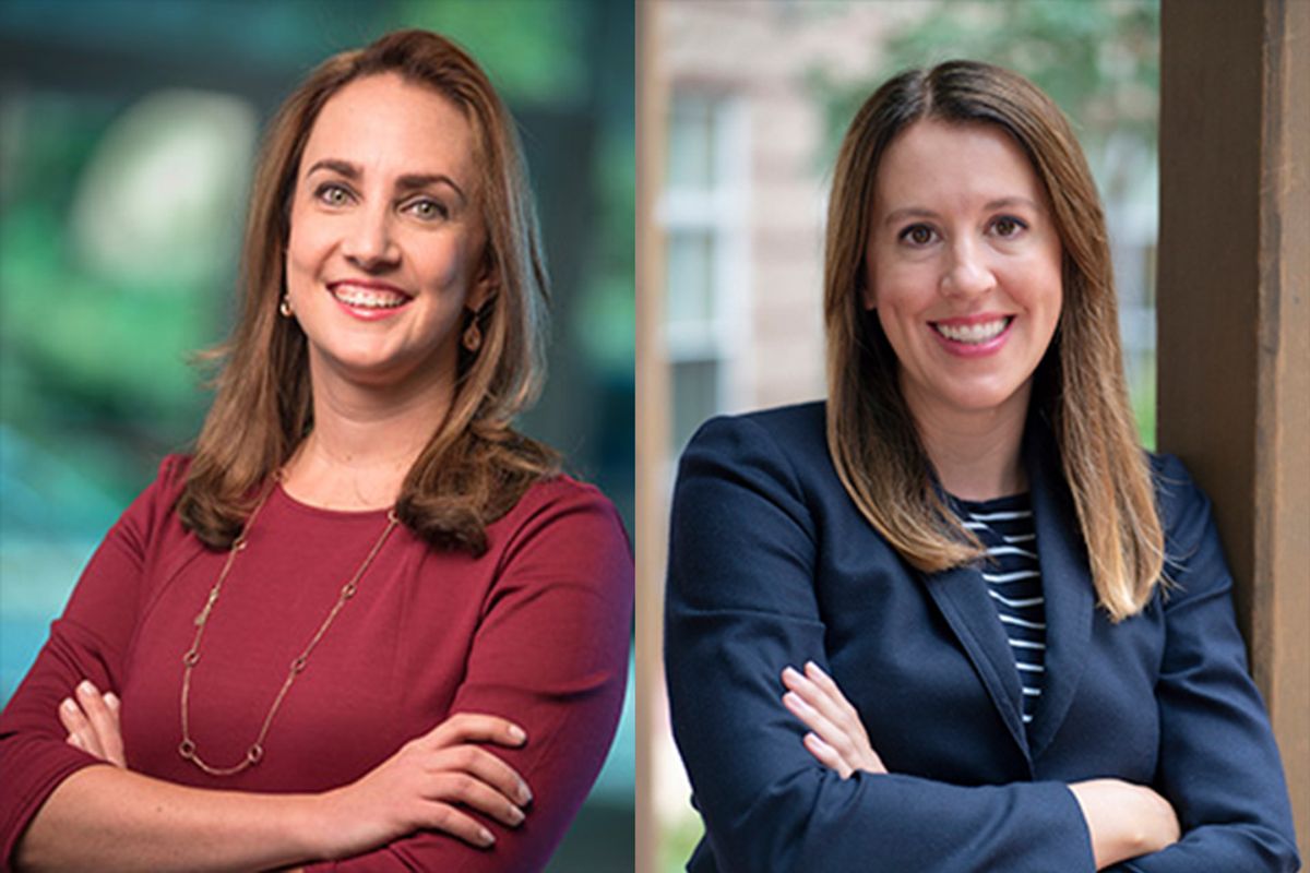 Side by side headshots of WVU faculty members Laurel Cook and Amy Cyphert. Laurel is wearing a red sweater and has her arms crossed. Amy is wearing a blue jacket over a blue and white striped blouse and also has her arms crossed. Both have brown hair. 