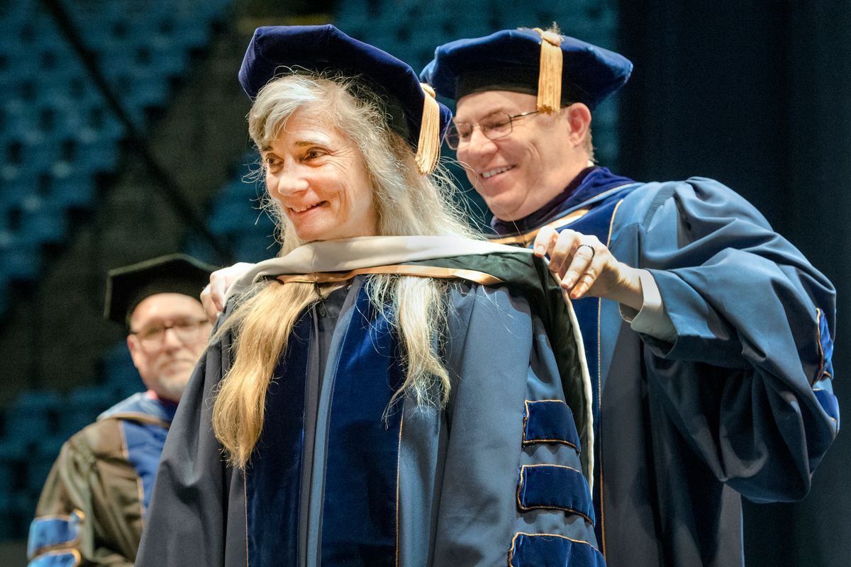Photo of Ann Pancake receiving honorary doctorate at Eberly Commencement