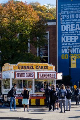A food truck offering funnel cakes, lemonade and other items is set up outside the Mountainlair during Mountaineer Week.