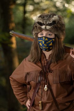 woman in mask and buckskins