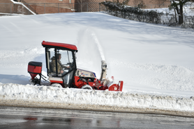 WVU facilities crews remove snow on campus.