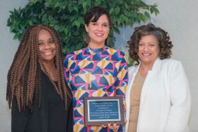 Keynote speaker Crystal Good receives the 2018 Martin Luther King Jr. Achievement Award at the 2018 Martin Luther King Unity Breakfast held at the Mountainlair Ballrooms on January 15, 2018.
