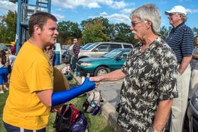 Jay Chattaway meets members of the WVU Marching Band.