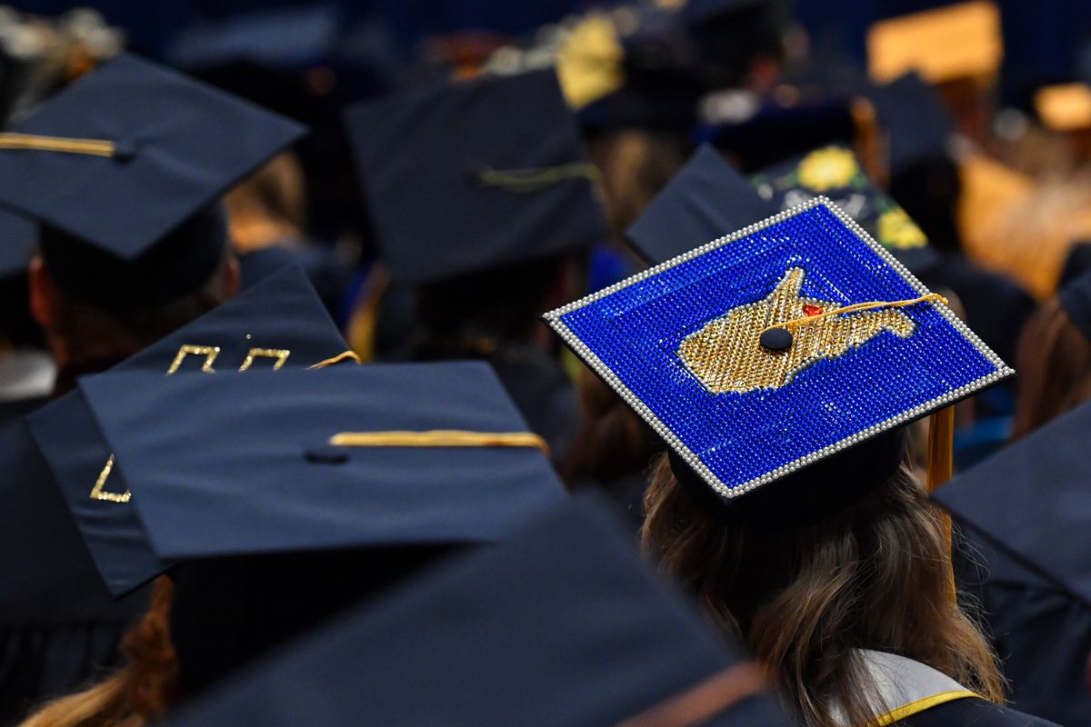 mortarboard decorated with outline of WV