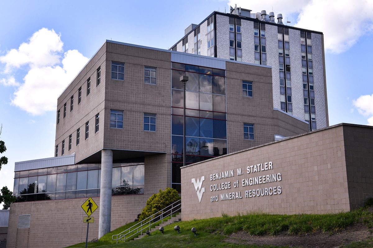 Exterior image of WVU Benjamin M. Statler College of Engineering and Mineral Resources with a blue sky full of clouds behind the building. 