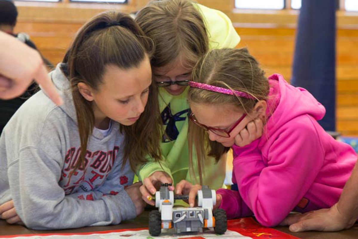 students work on robot