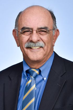 smiling old white man in suit