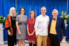 WVU President Gordon Gee poses with four members of the Hoylman family at an event at the WVU School of Medicine. 